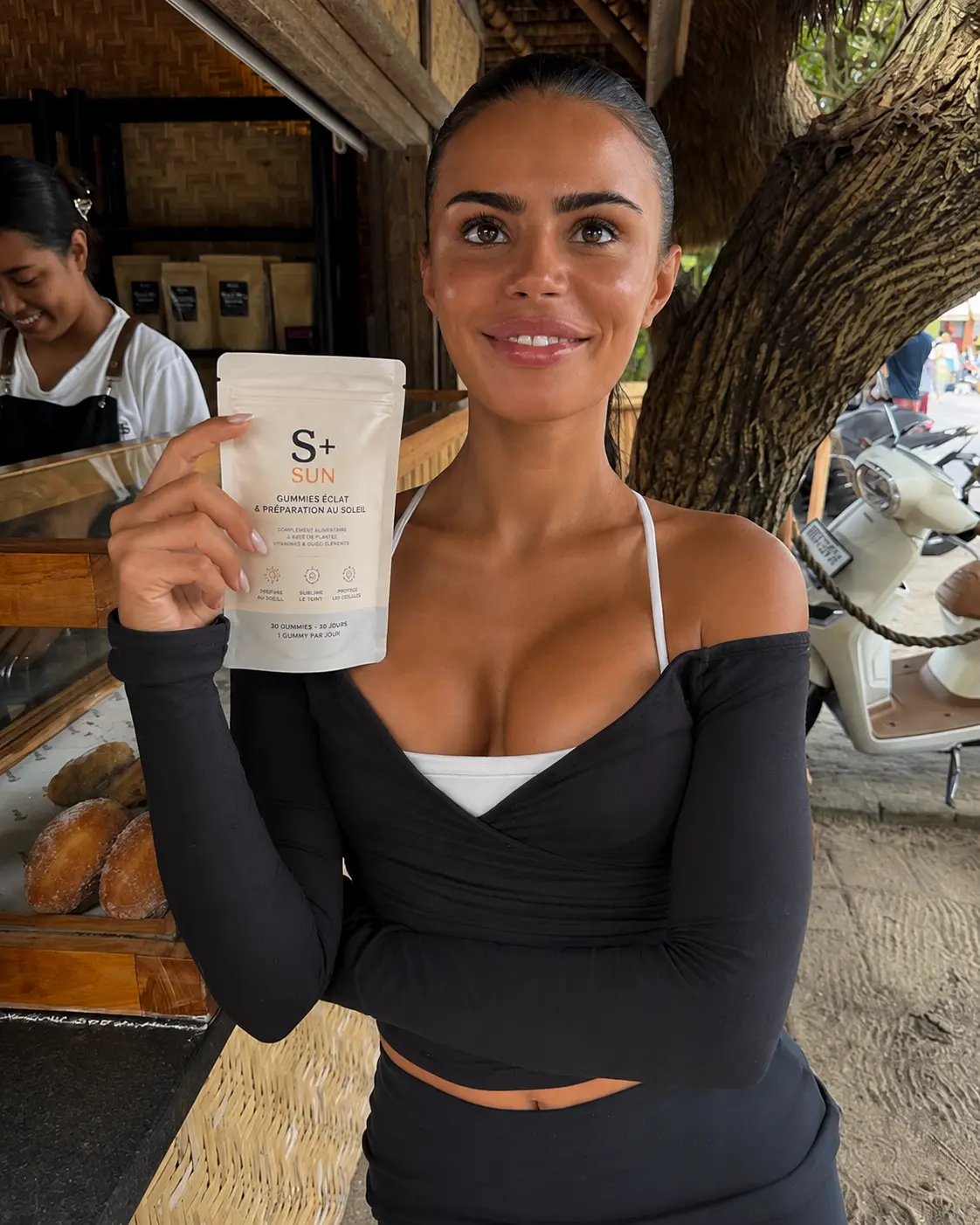 S+ customer travelling with the S+ SUN pouch