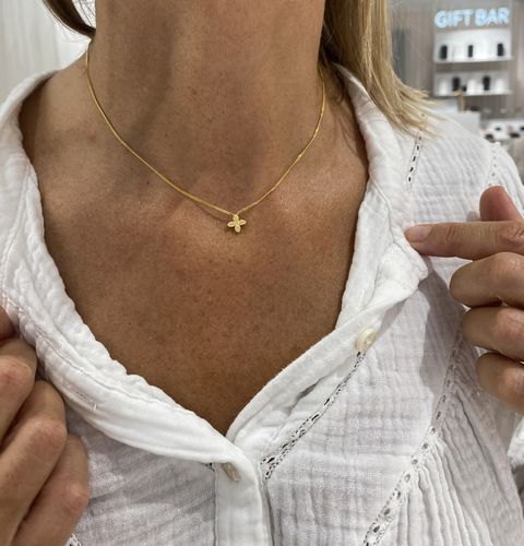 Tanned décolletage of an S+ customer
