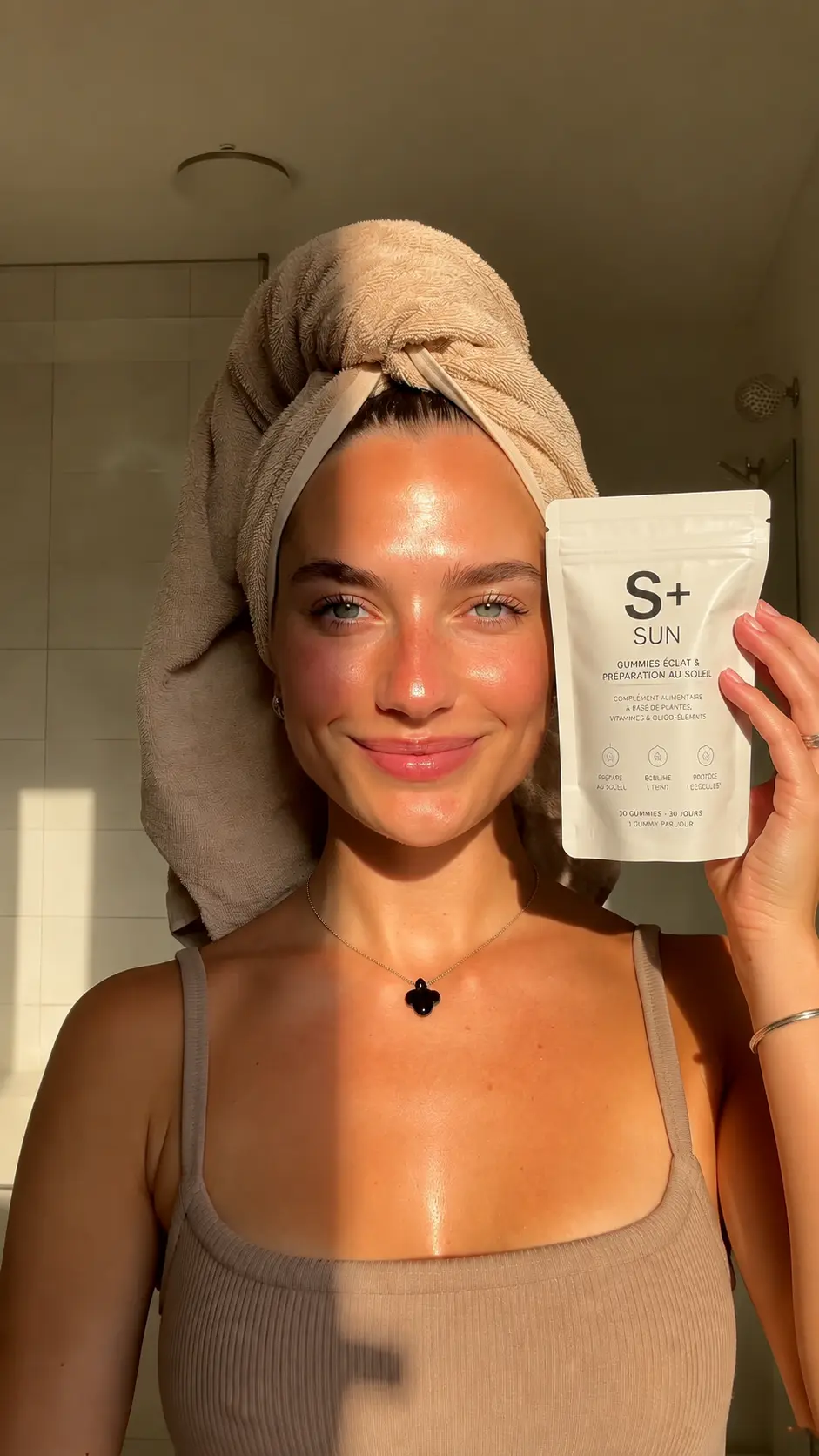 S+ customer after her shower with the S+ SUN pouch